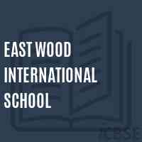 East Wood International School Logo